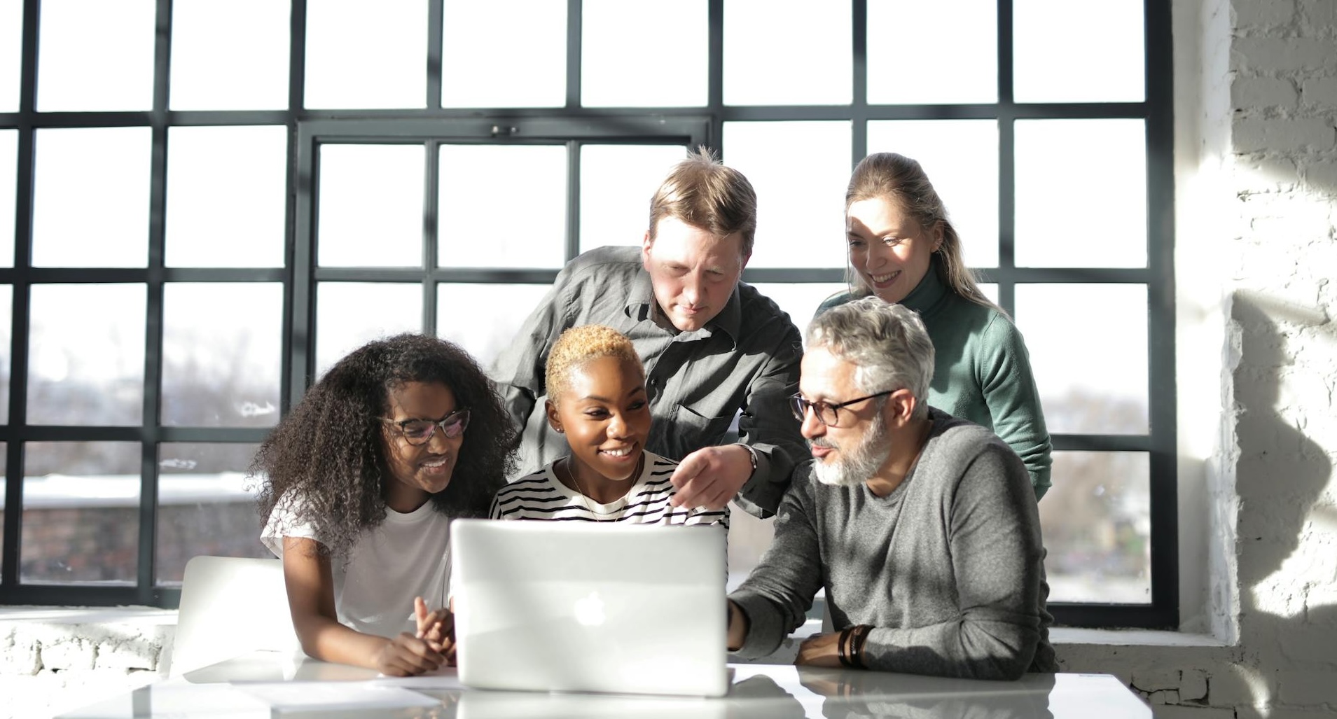 People looking at computer
