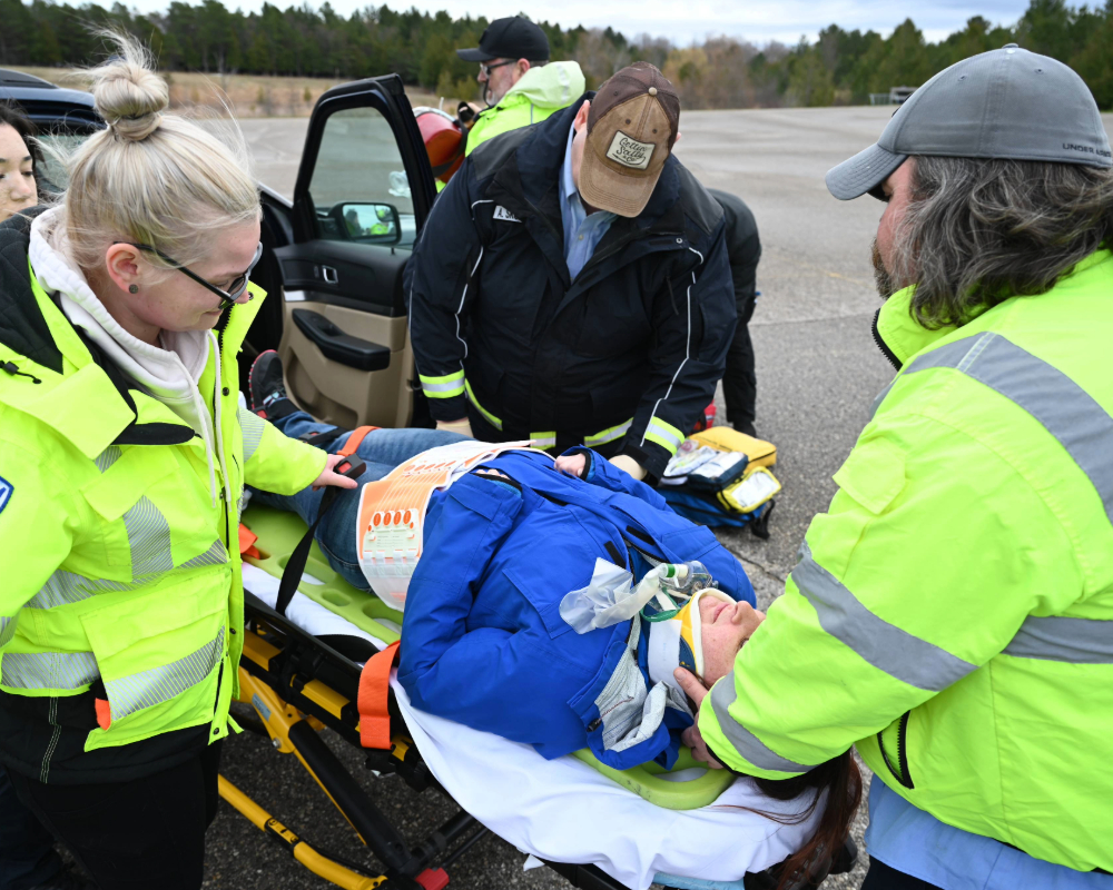 EMTs working on patient