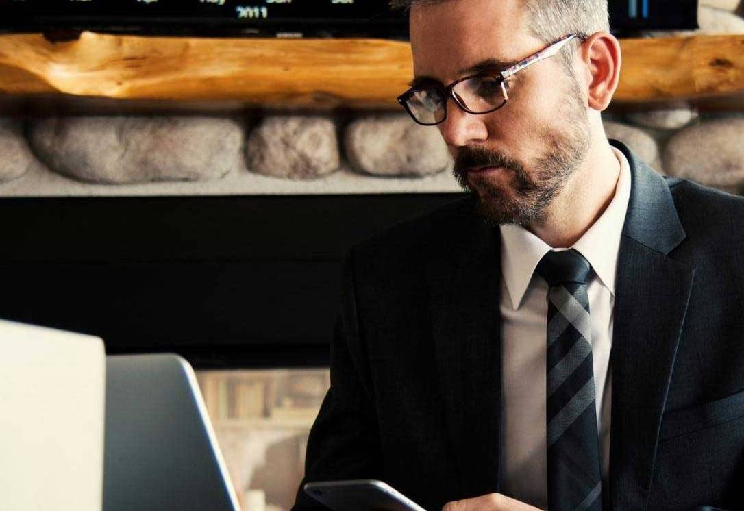 man looking at a computer screen