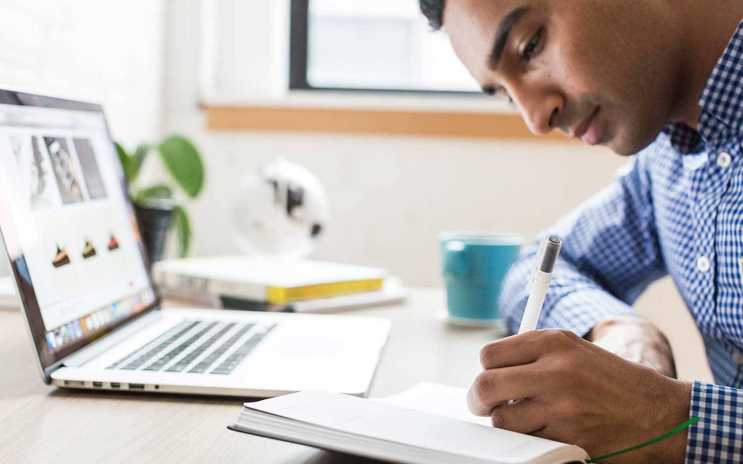 man taking notes