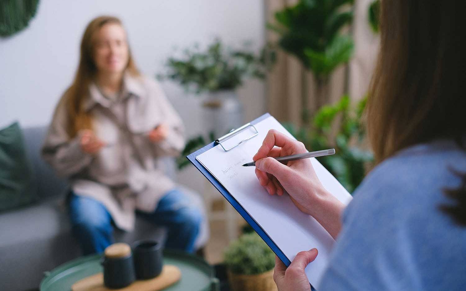 person meeting with counselor