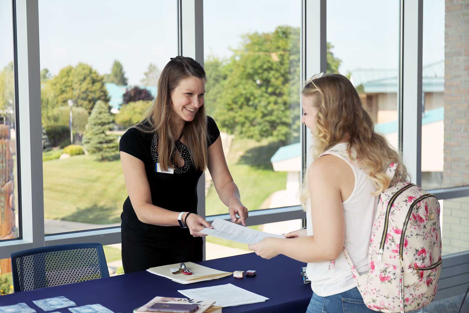 student meeting with financial aid advisor