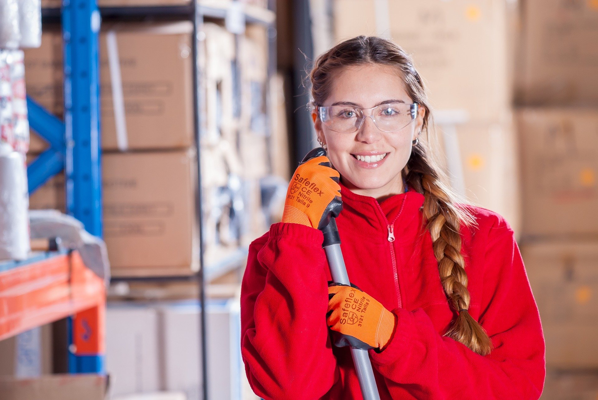 Friendly manufacturing specialist smiling at camera