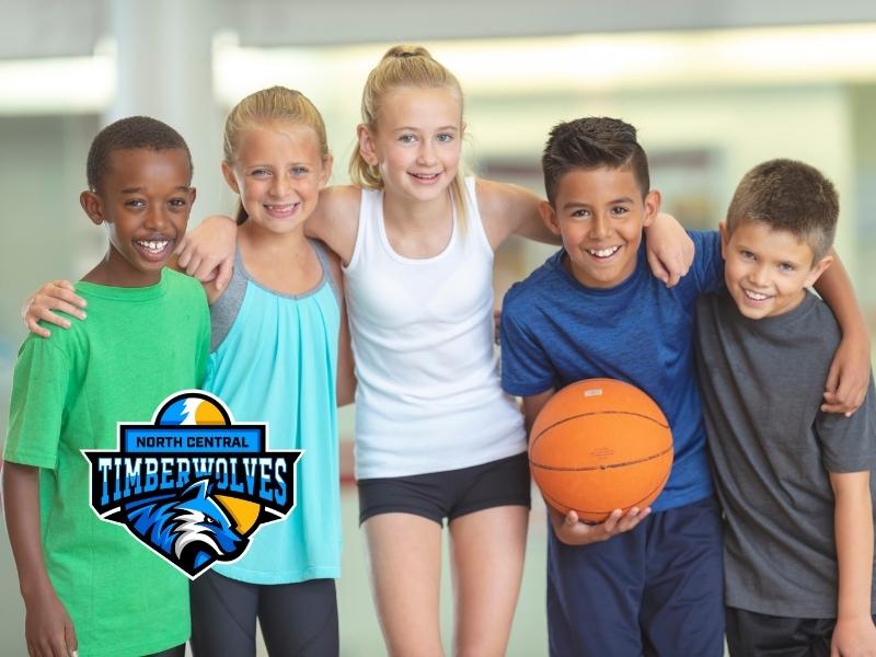 Kids posing with basketball