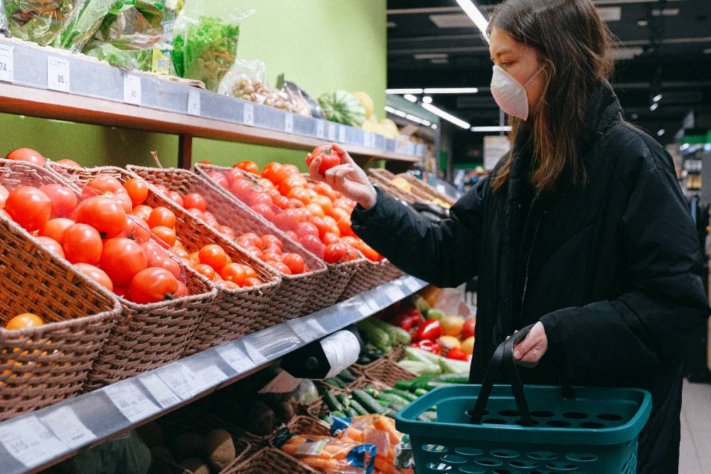 Woman shopping for fresh produce