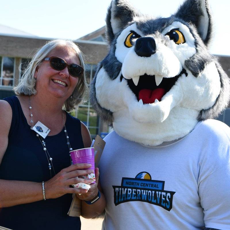 Timberwolf mascot with woman