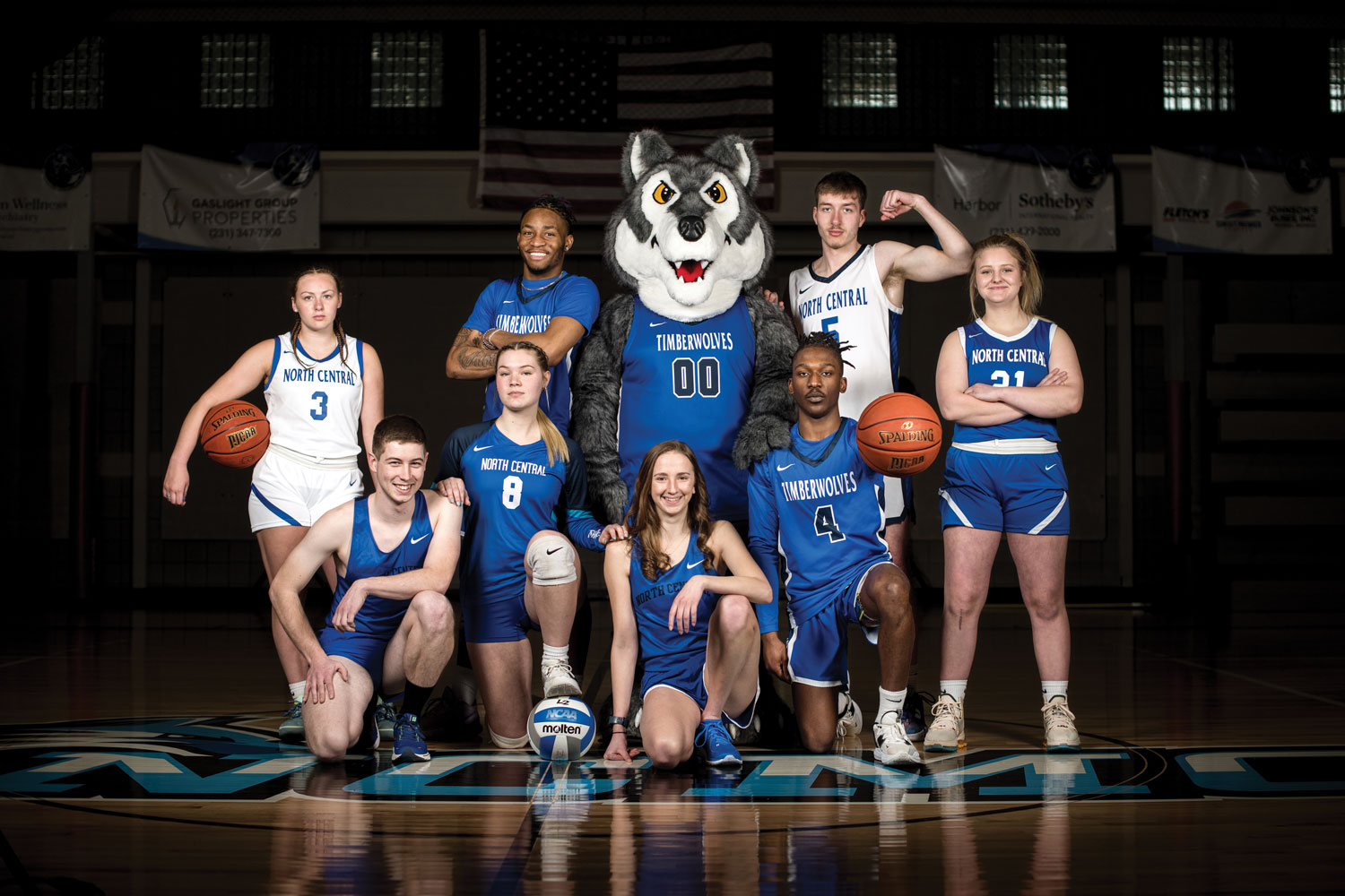 NCMC student-athlete group photo with Timberwolf mascot