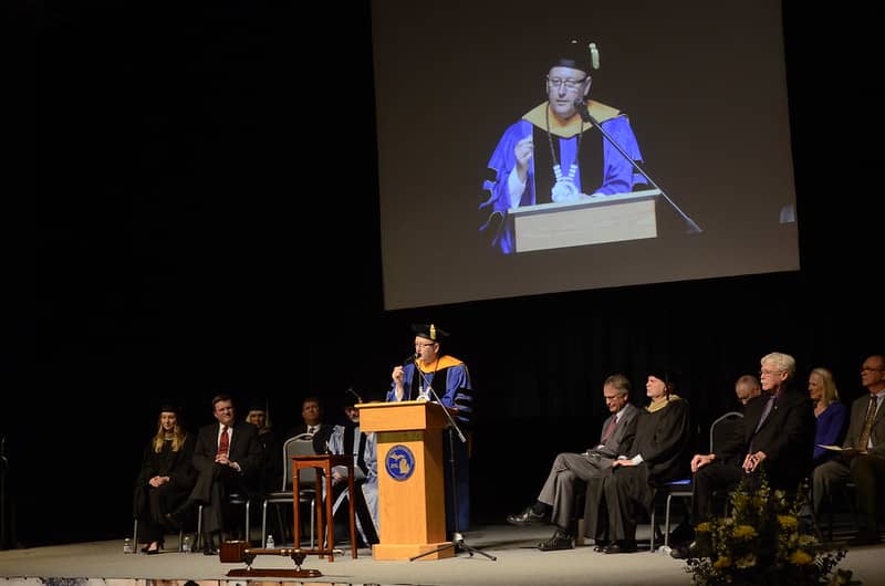 President Finley speaking from podium