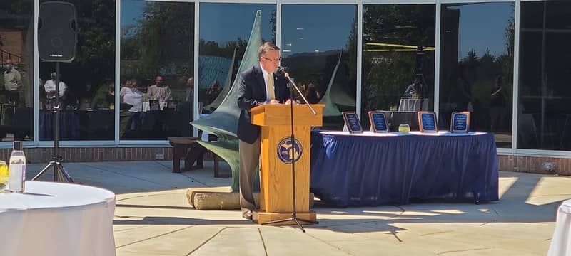 President Finley speaking from podium