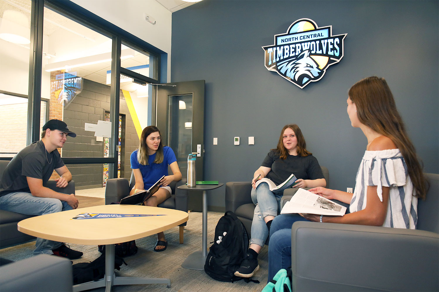 Students in a meeting.