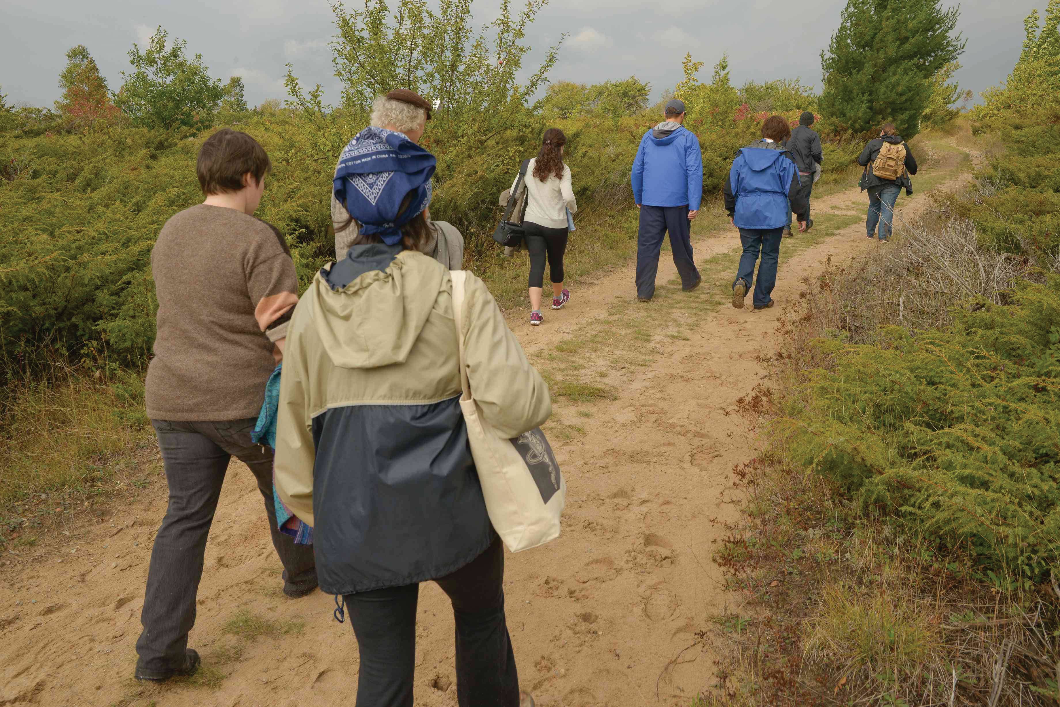 Students walking on a trail