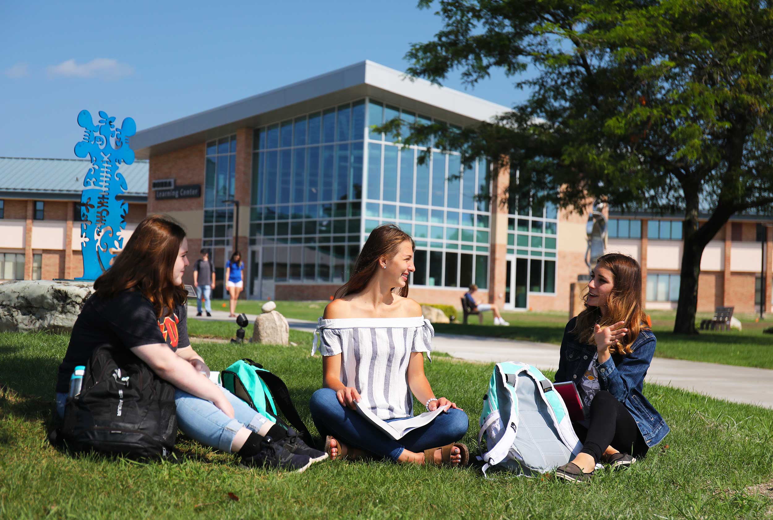 Students sitting outside